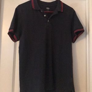 Navy polo with red stripe accents